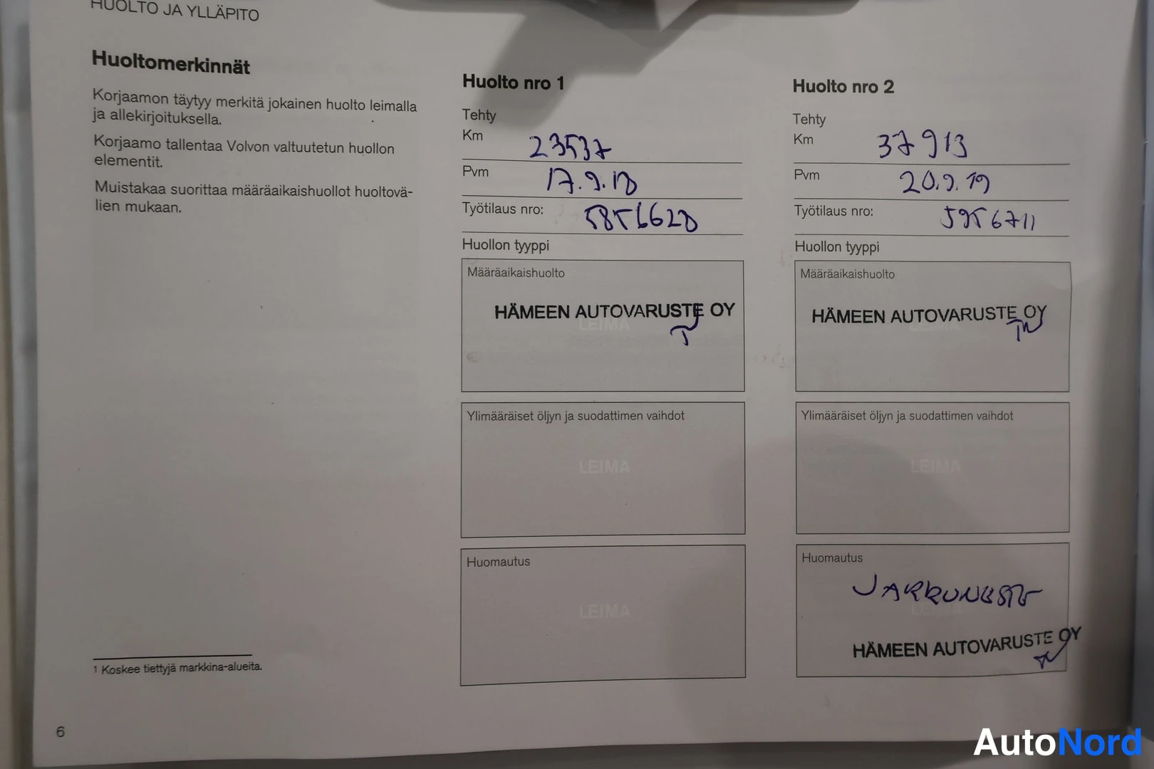 Yksityiskohta: Huolto-ohjeiden ja kirjattujen huoltojen taulukko: huolto nro 1 (23 537 km, 17.9.2018) ja huolto nro 2 (37 913 km, 20.9.2019), molemmat HÄMEEN AUTOVARUSTE OY:n
