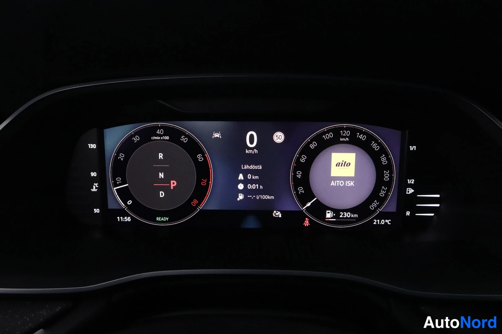 Ohjaamo: Digital instrument cluster displays gear selection R, N, D. Speedometer reads 0 km/h, tachometer at idle. Range indicator shows 230 km and current fuel consumpt