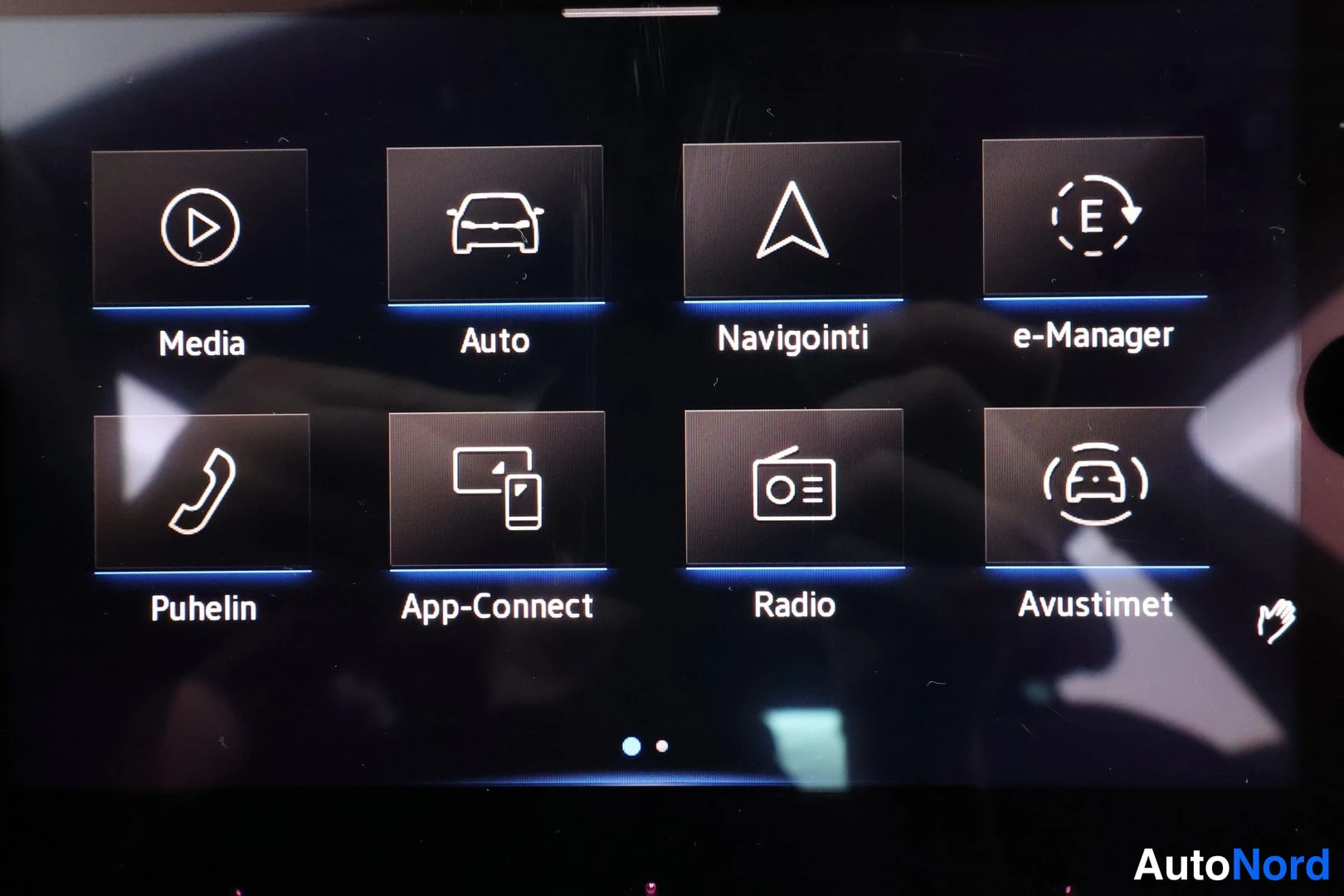 Ohjaamo: Main infotainment home menu on a touchscreen display.