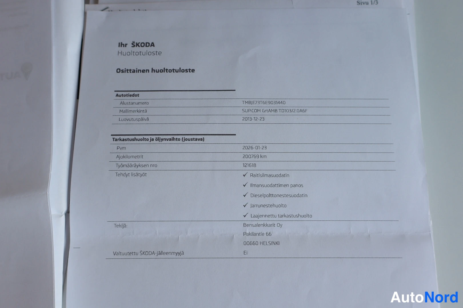 Muu: Huoltotuloste Skoda-autoa varten, jossa huollot ja ajokilometrit 200 769 km.