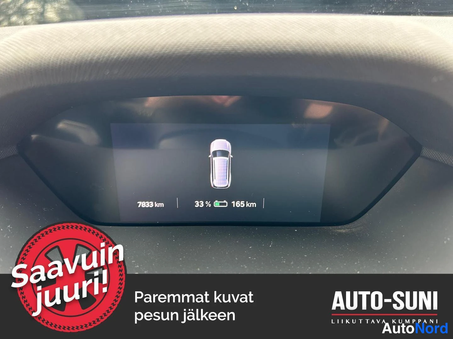 Muu: A green Skoda Enyaq dashboard, showing the odometer and battery life.