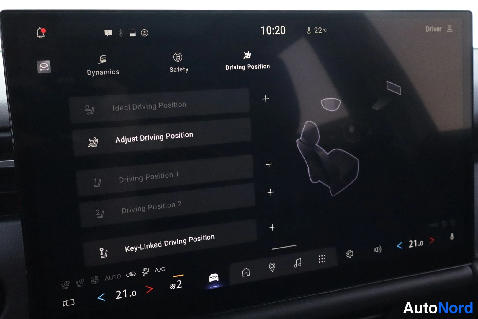 Muu: Auton näyttö Driving Position -valikossa, jossa on kohdat Ideal Driving Position, Adjust Driving Position, Driving Position 1 ja 2 sekä Key-Linked Driving Posit