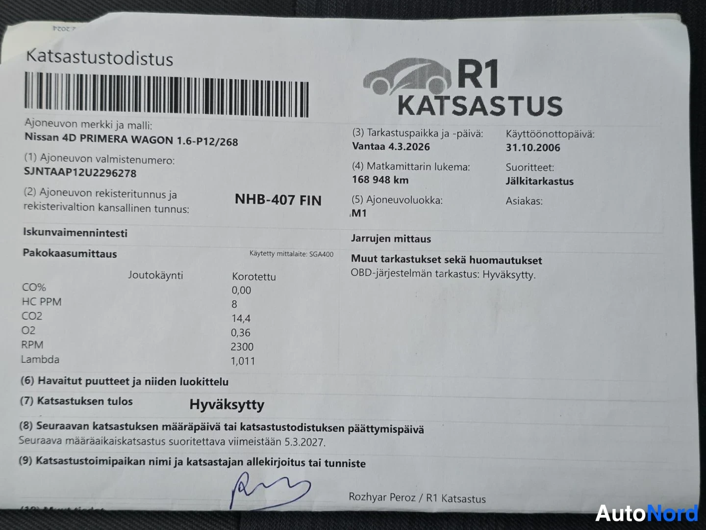 Asiakirja: Katsastustodistus vuodelta 2006. Nissan 4D PRIMERA WAGON 1.6-P12/268, rekisterinumero FIN, matkamittarin lukema 168 948 km.
