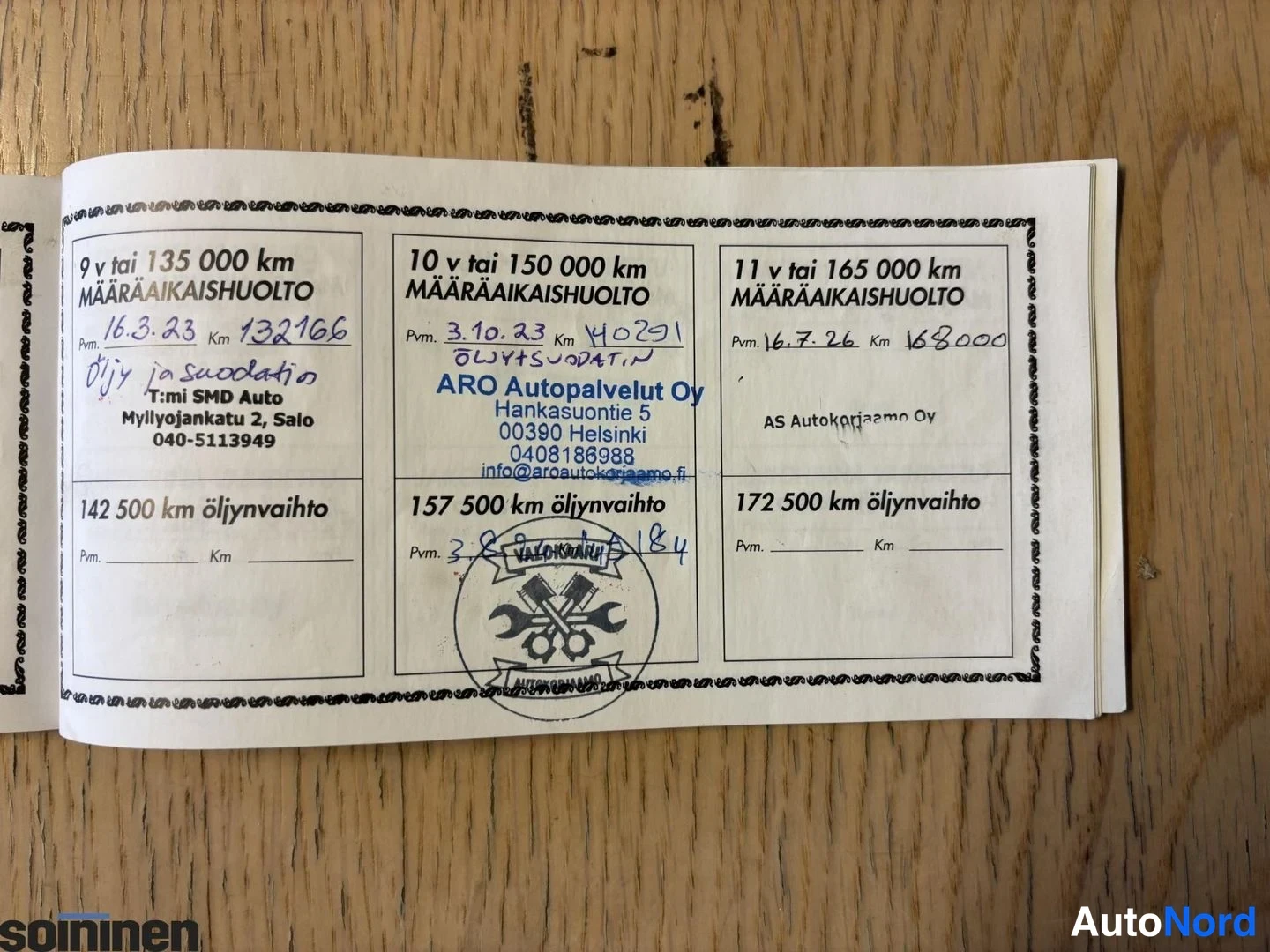 Muu: Huoltokirjan sivu täytettyine huoltomerkintöineen.