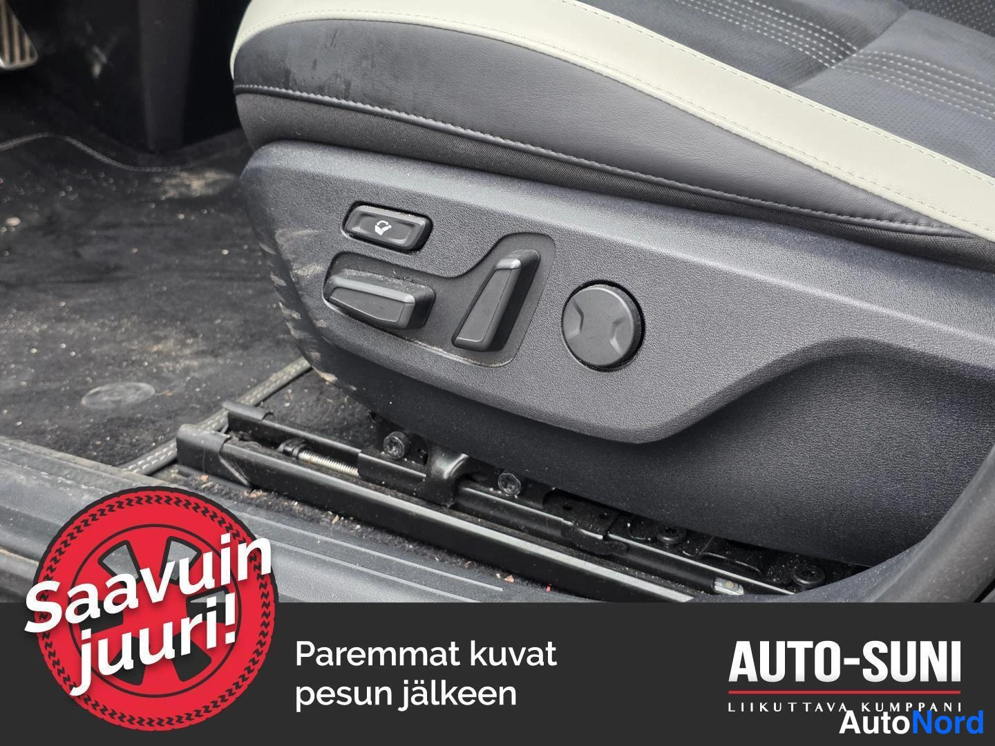 Muu: Sähköistettävän etuistuimen säätönappulat istuimen sivussa; istuin on musta ja valkoinen.
