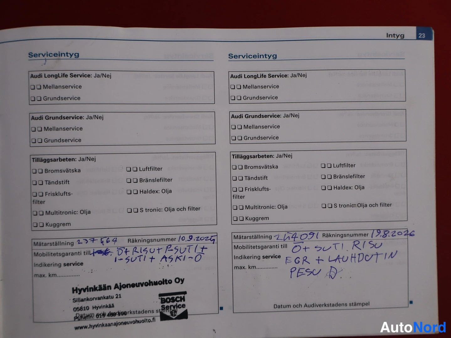 Asiakirja: Käsinkirjoitettuja huoltomerkintöjä sisältävä Audi-huoltokirjan sivu (Intyg 23).