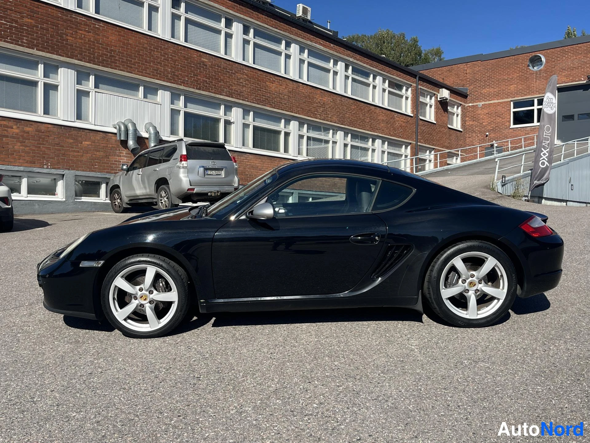 Musta Porsche Cayman 2009, ulkokuva 3
