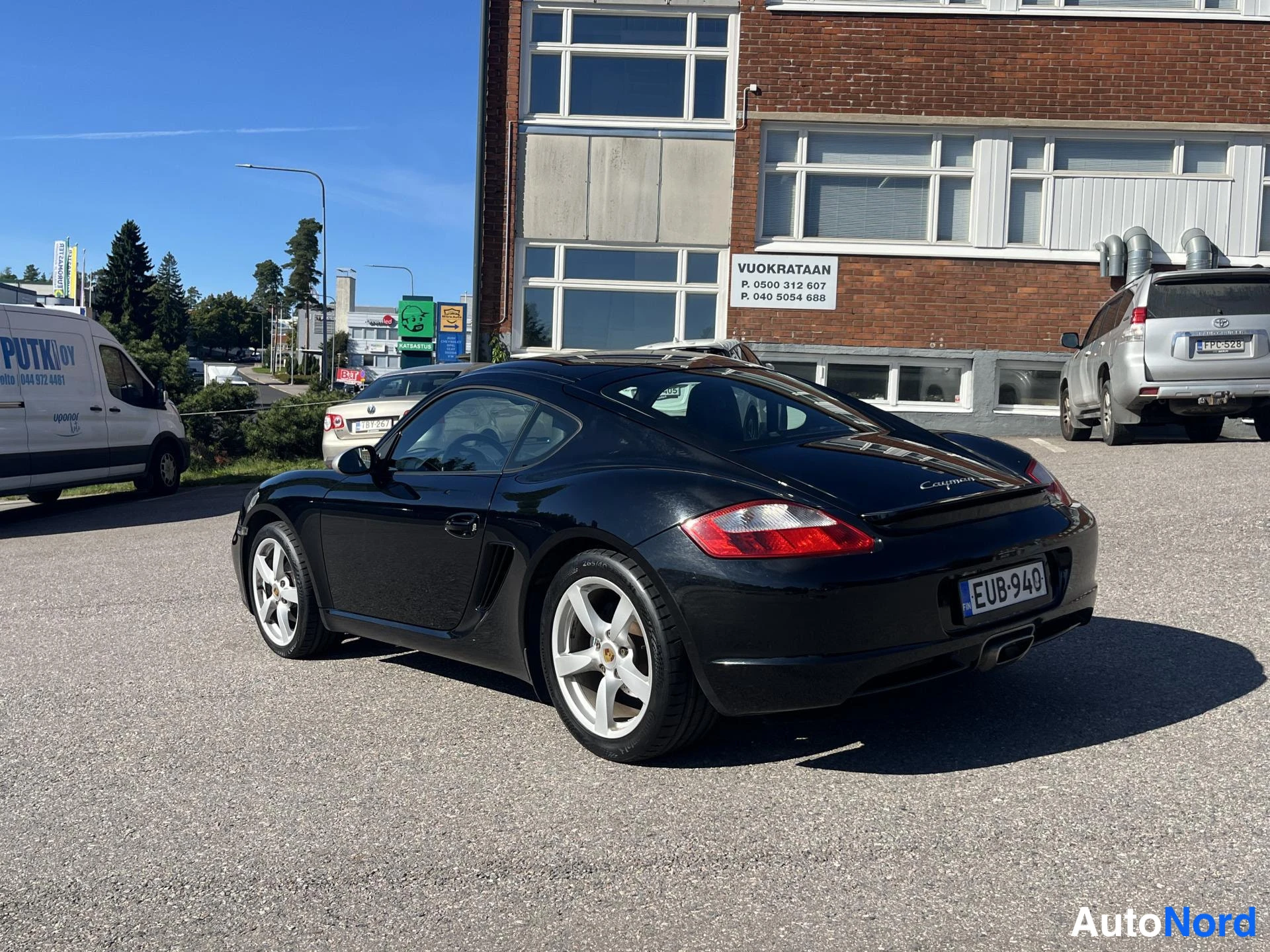 Musta Porsche Cayman 2009, ulkokuva 4