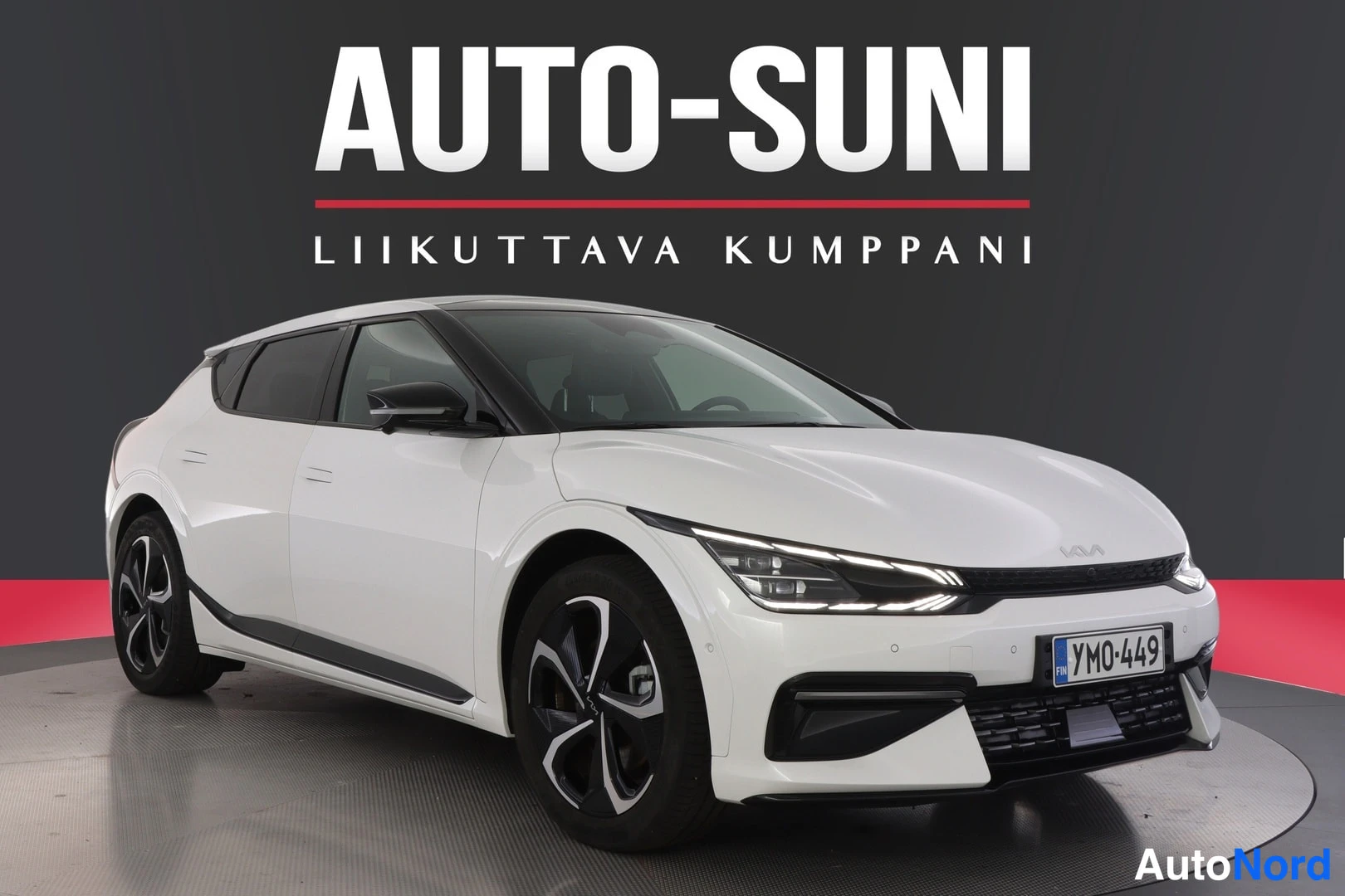 Valkoinen Kia EV6 2024, etuviisto, keula oikealle, kuva 2