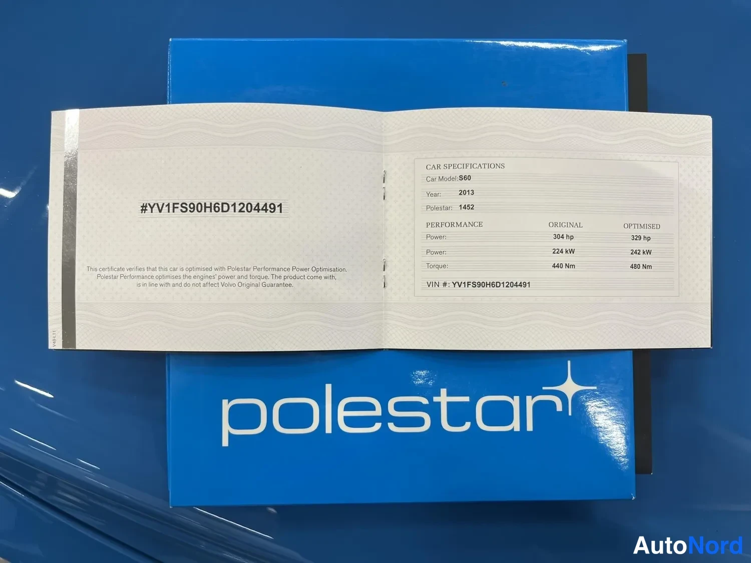 Yksityiskohta: Polestar-sertifikaatti avattuna, VIN YV1FS90H6D1204491, specs S60 2013, teho 304 hv / 329 hv.