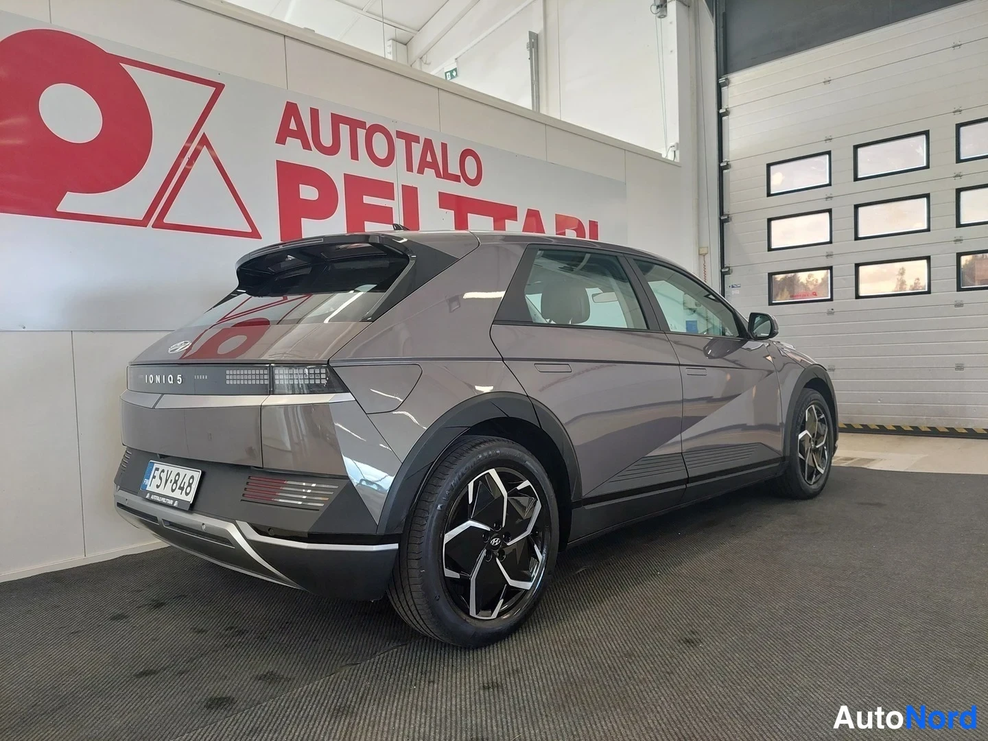 Ruskea Hyundai IONIQ 5 2022, takaviisto, kuva 12