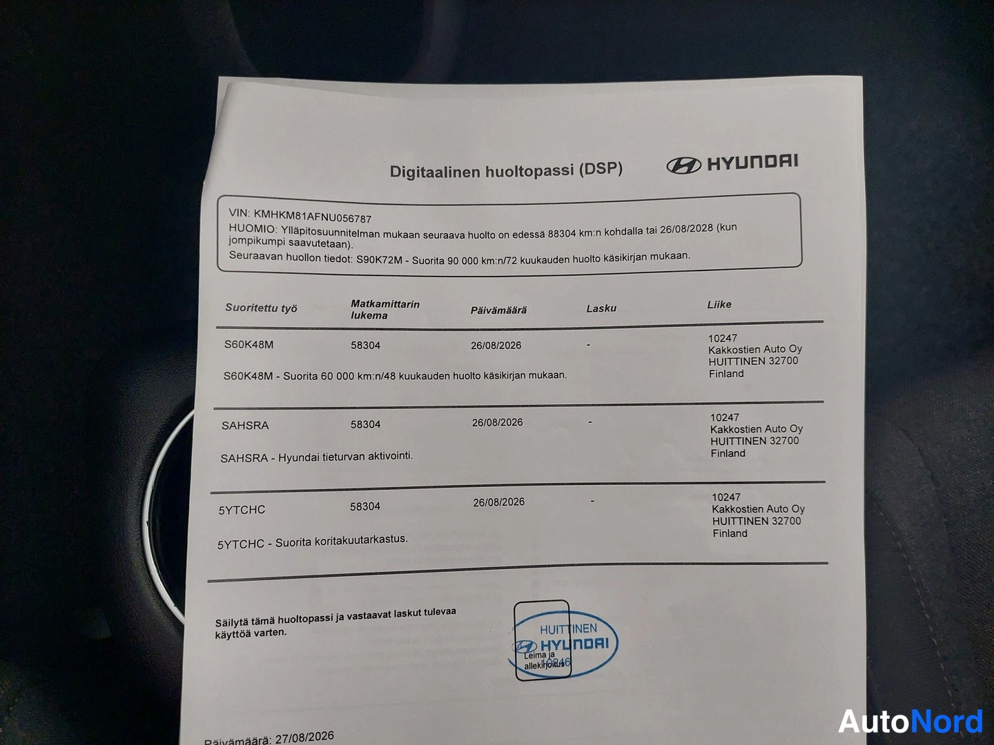 Muu: Huoltopassihärköri: tulostettu Hyundai Digitalainen huoltopassi (DSP) A4-paperilla tummalla sisätilan taustalla.