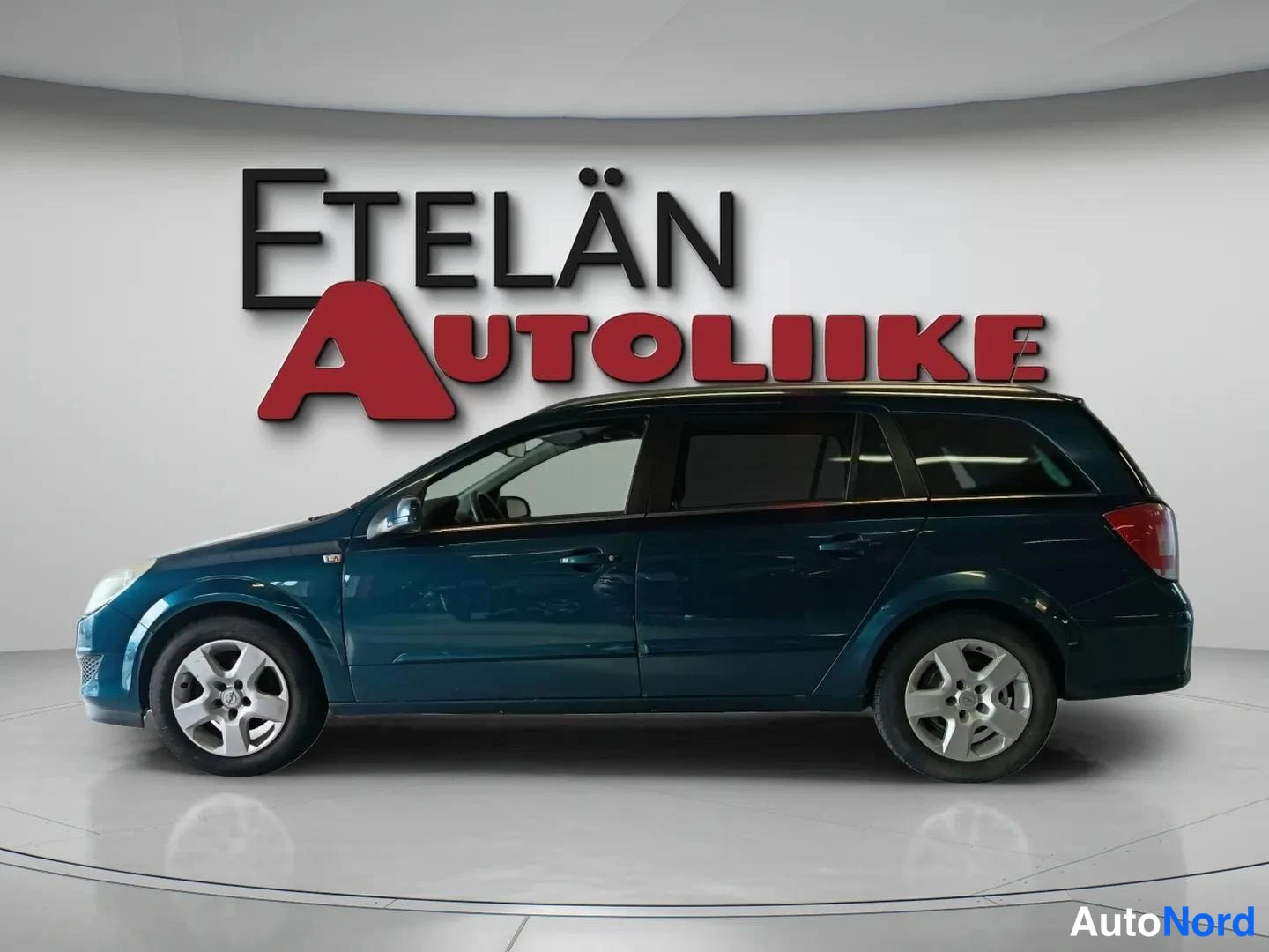 Sininen Opel Astra 2007, sivulta, kuva 5