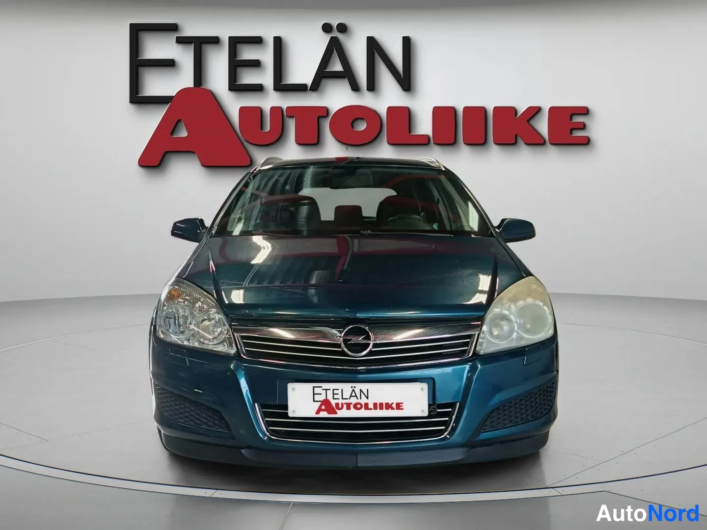 Sininen Opel Astra 2007, edestä, kuva 3