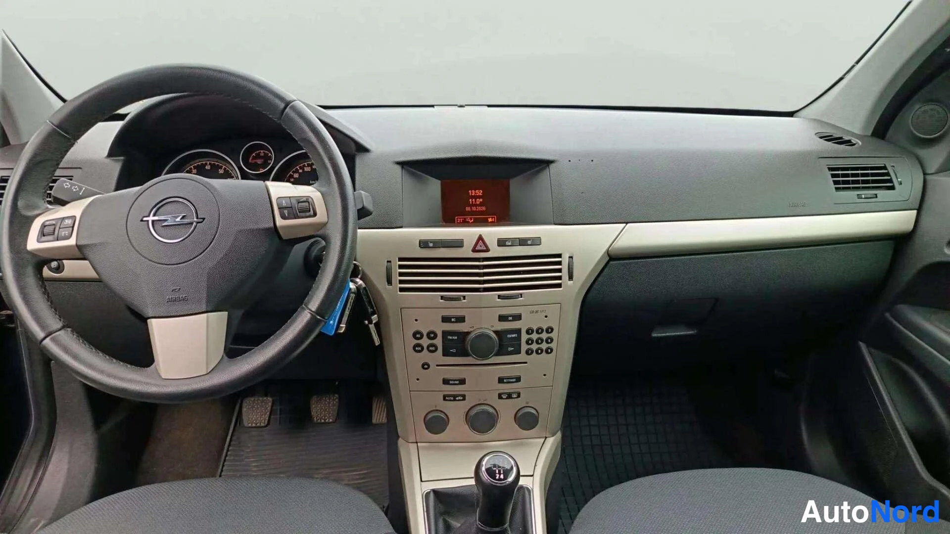 Sininen Opel Astra 2007, ohjaamo, kuva 10