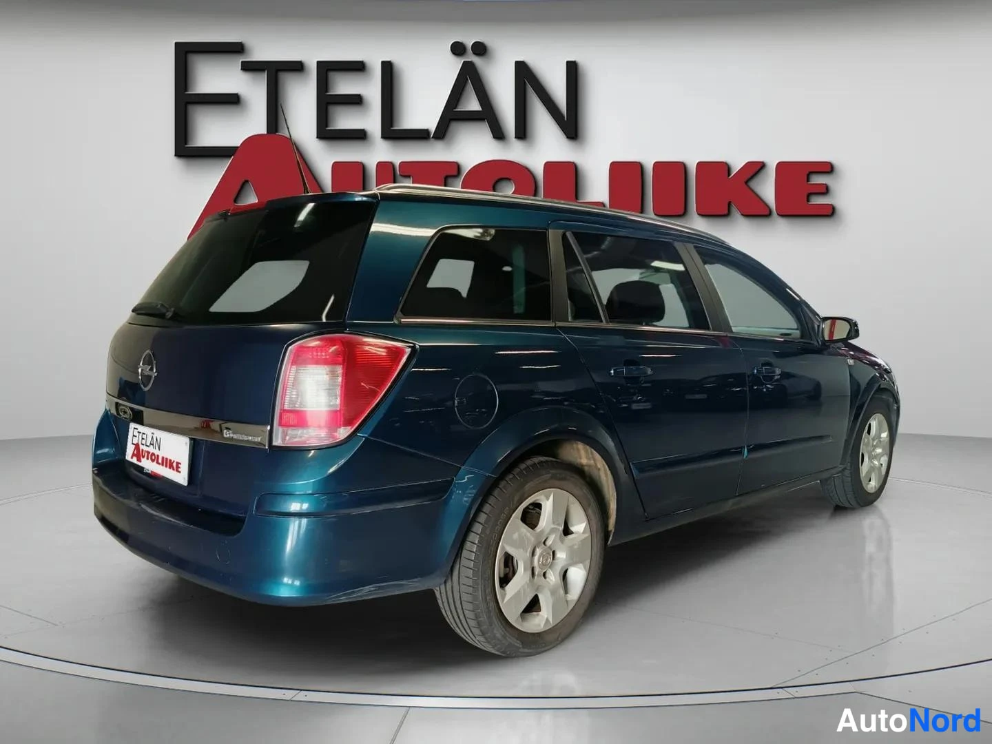 Sininen Opel Astra 2007, takaviisto, kuva 6