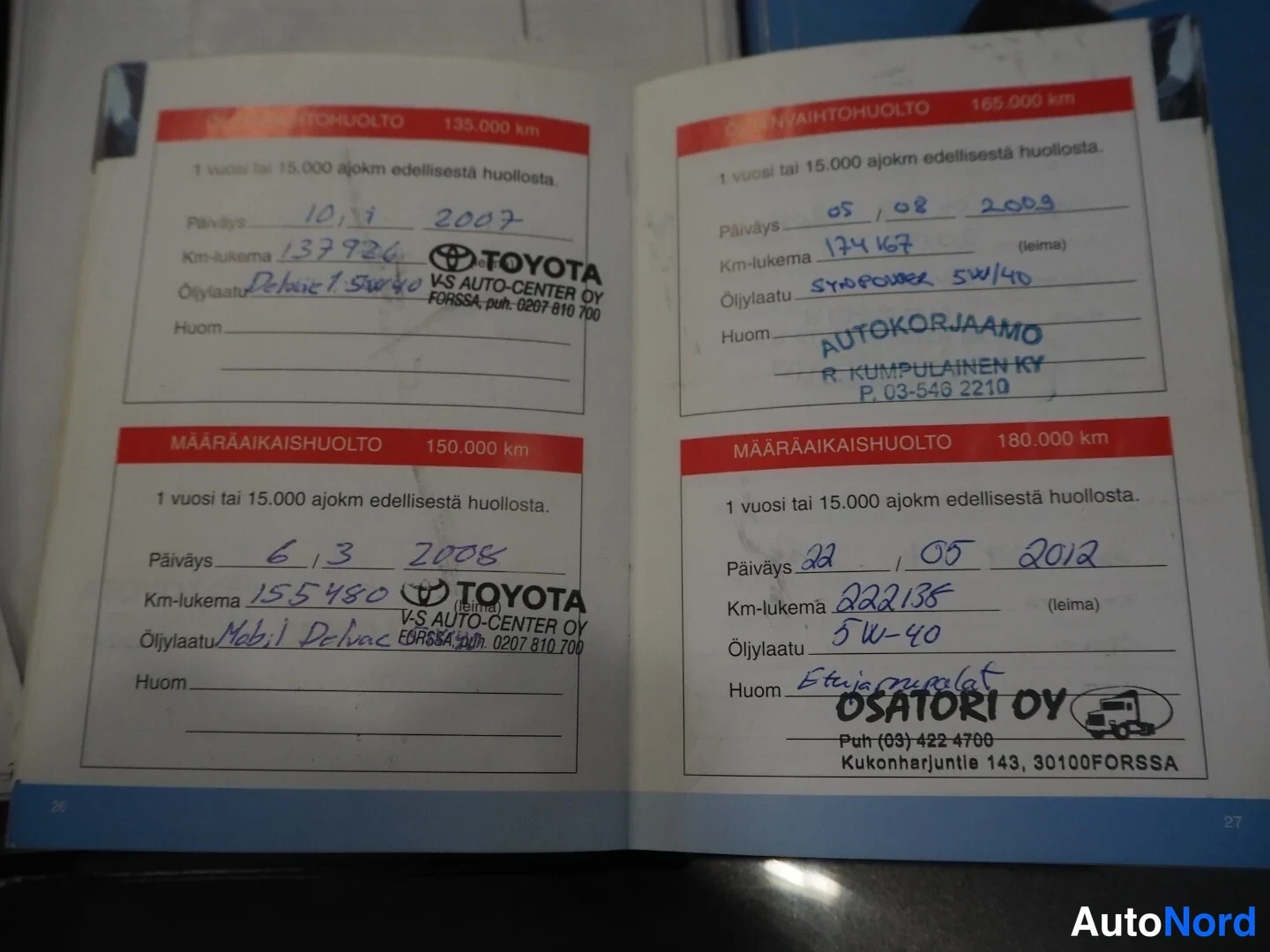 Asiakirja: A close-up of a service book page showing six maintenance records with varying degrees of legibility. Services are noted for years 2007 through 2012 with distan
