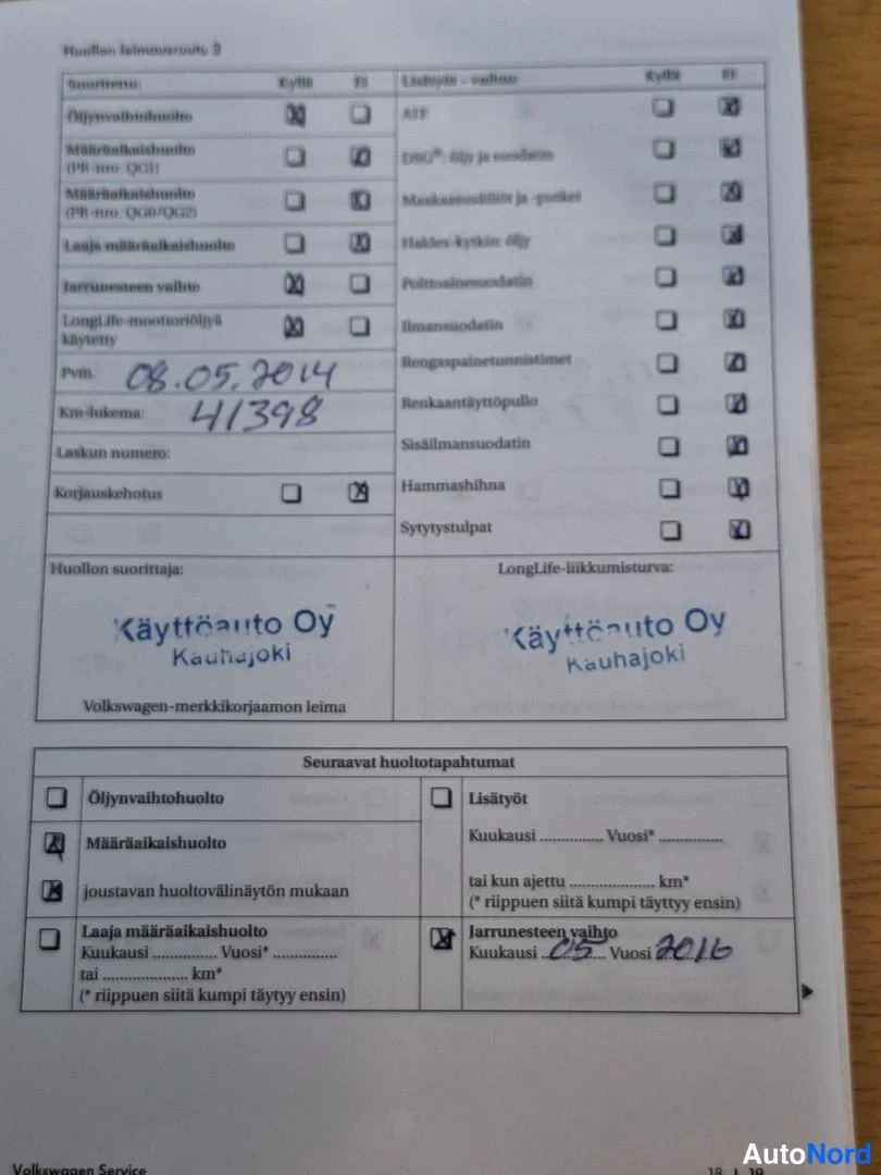 Asiakirja: Another service sheet, Huollon leimausruutu 2, shows a later entry dated 08.05.2014 with a recorded mileage of 41398 km. The document also has the stamped logo