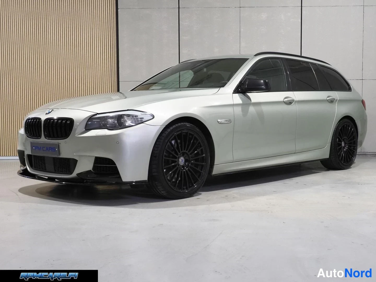 Hopea BMW M550d 2013, etuviisto, keula vasemmalle, kuva 3