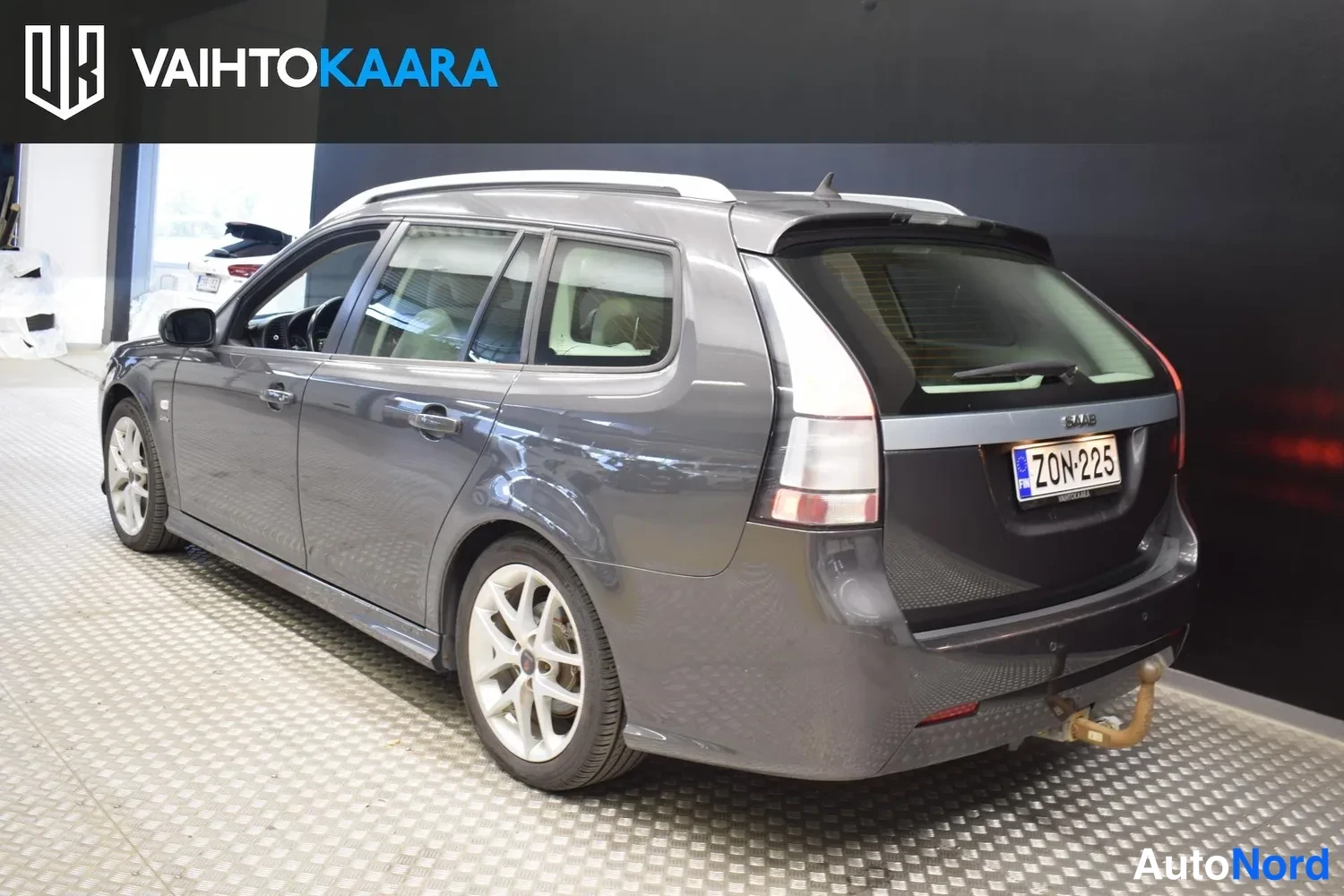 Harmaa Saab 9-3 2011, takaviisto, kuva 6