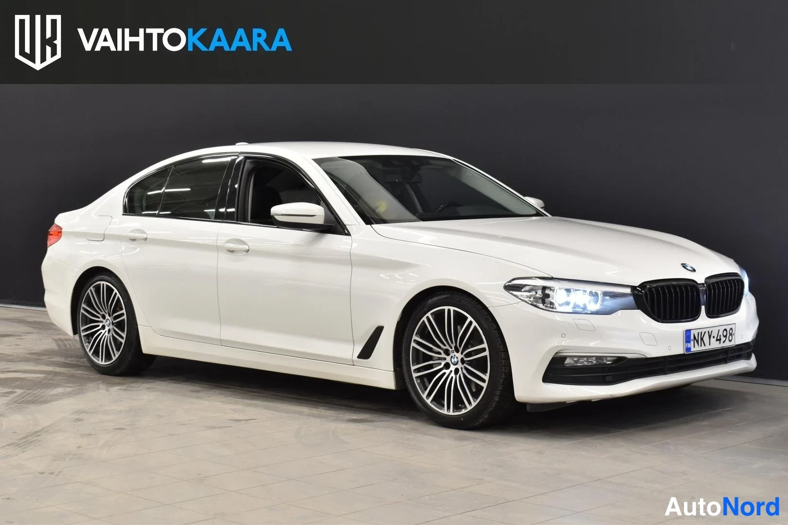 Valkoinen BMW 520d 2018, etuviisto, keula oikealle, kuva 5