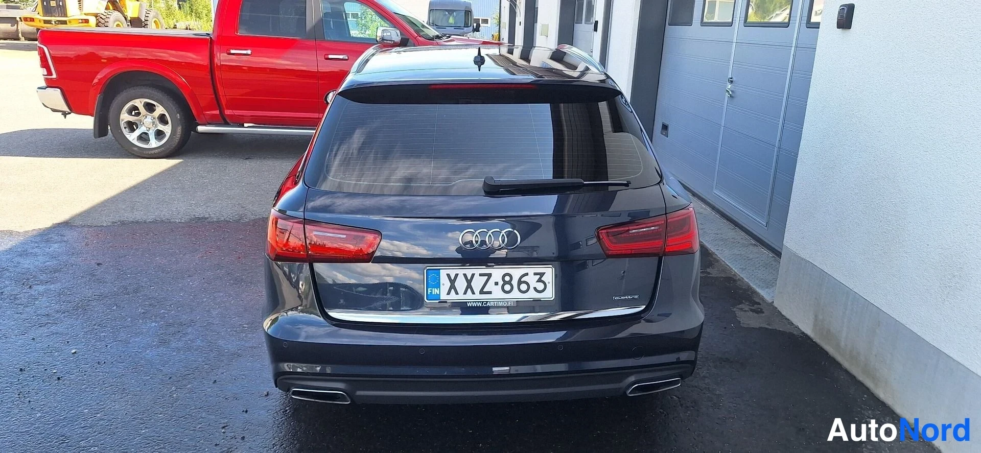 Takaa: Audi A6 Avant takaapäin kuvattuna, rekisteritunnus.