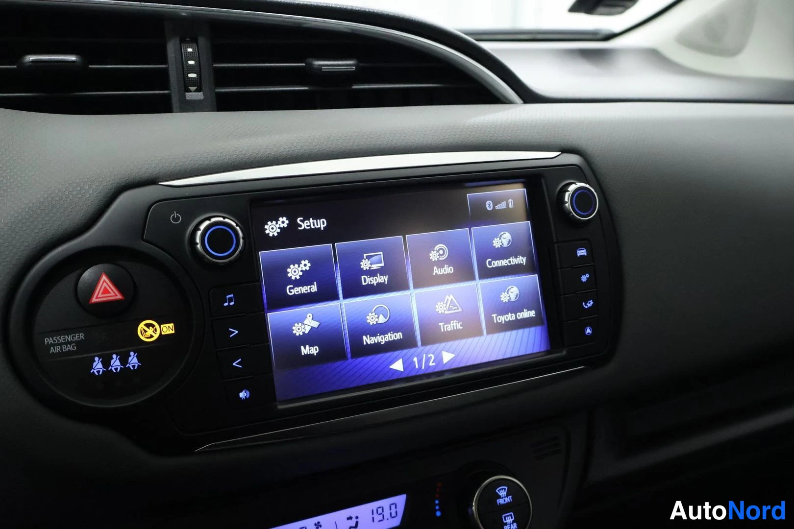 Ohjaamo: Infotainment setup menu on the center display. Options such as 'Setup', 'General', 'Display', 'Audio', 'Connectivity', 'Map', 'Navigation', and 'Toyota online'