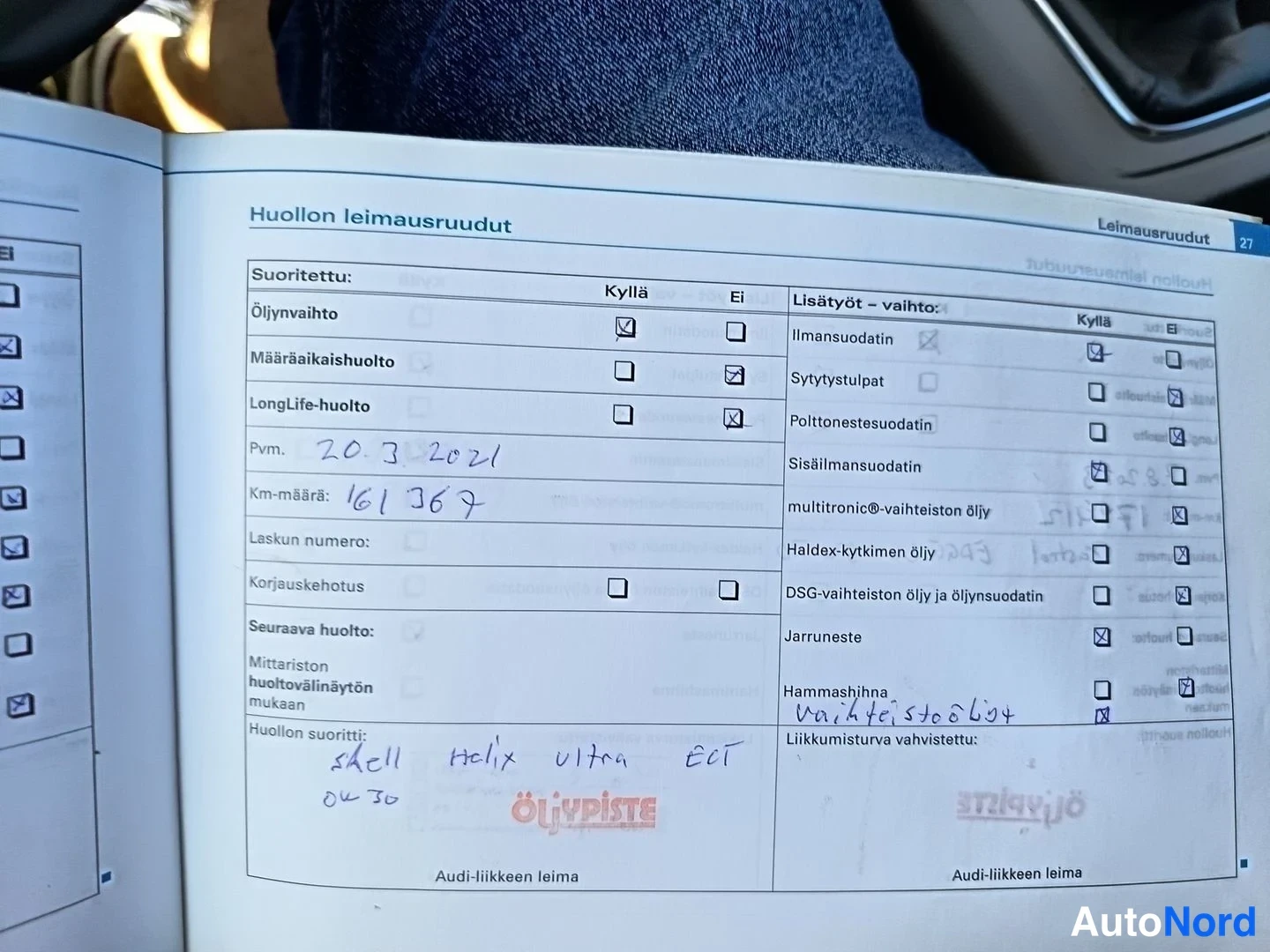 Muu: Audi-huoltokirjan huollon leimausruudut -sivu, käsin kirjoitettu päivämäärä 20.3.2021 ja km-määrä 161367