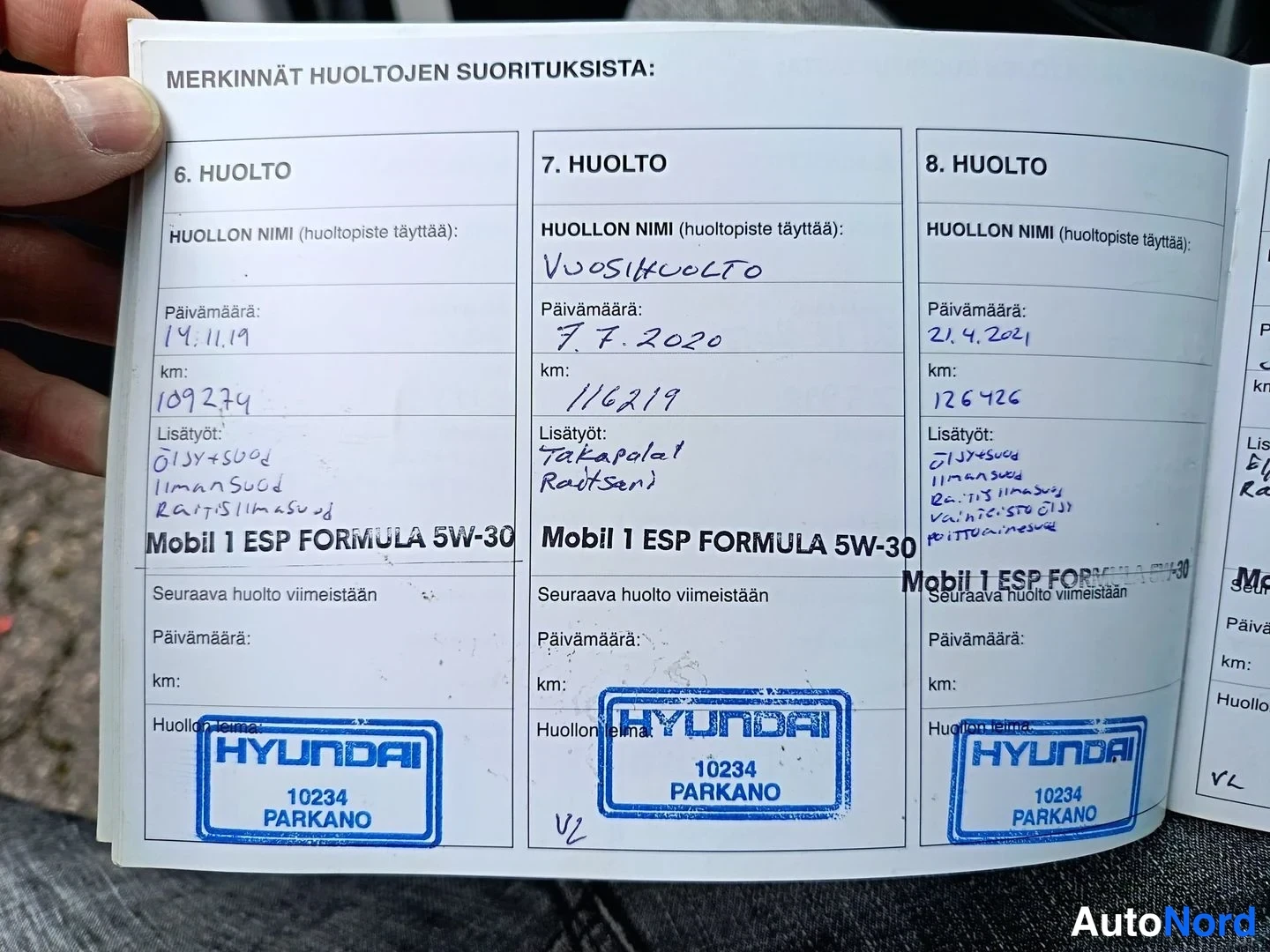 Muu: Huoltokirjan sivu, jossa 6., 7. ja 8. huolto täytetty vuosina 2019–2021, kilometrilukemin ja Hyundai 10234 Parkano -leimat.