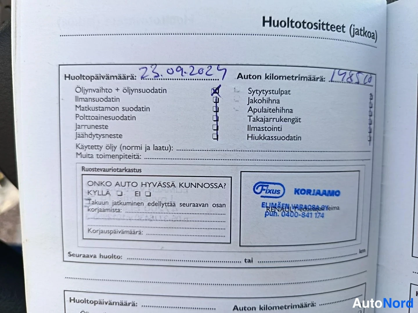 Yksityiskohta: Avoin huoltokirja, sivu Huoltotositteet (jatkoa), huolto merkitty päivämäärällä 23.09.2024 ja kilometrimäärällä 198510, Fixus korjaamon leima.