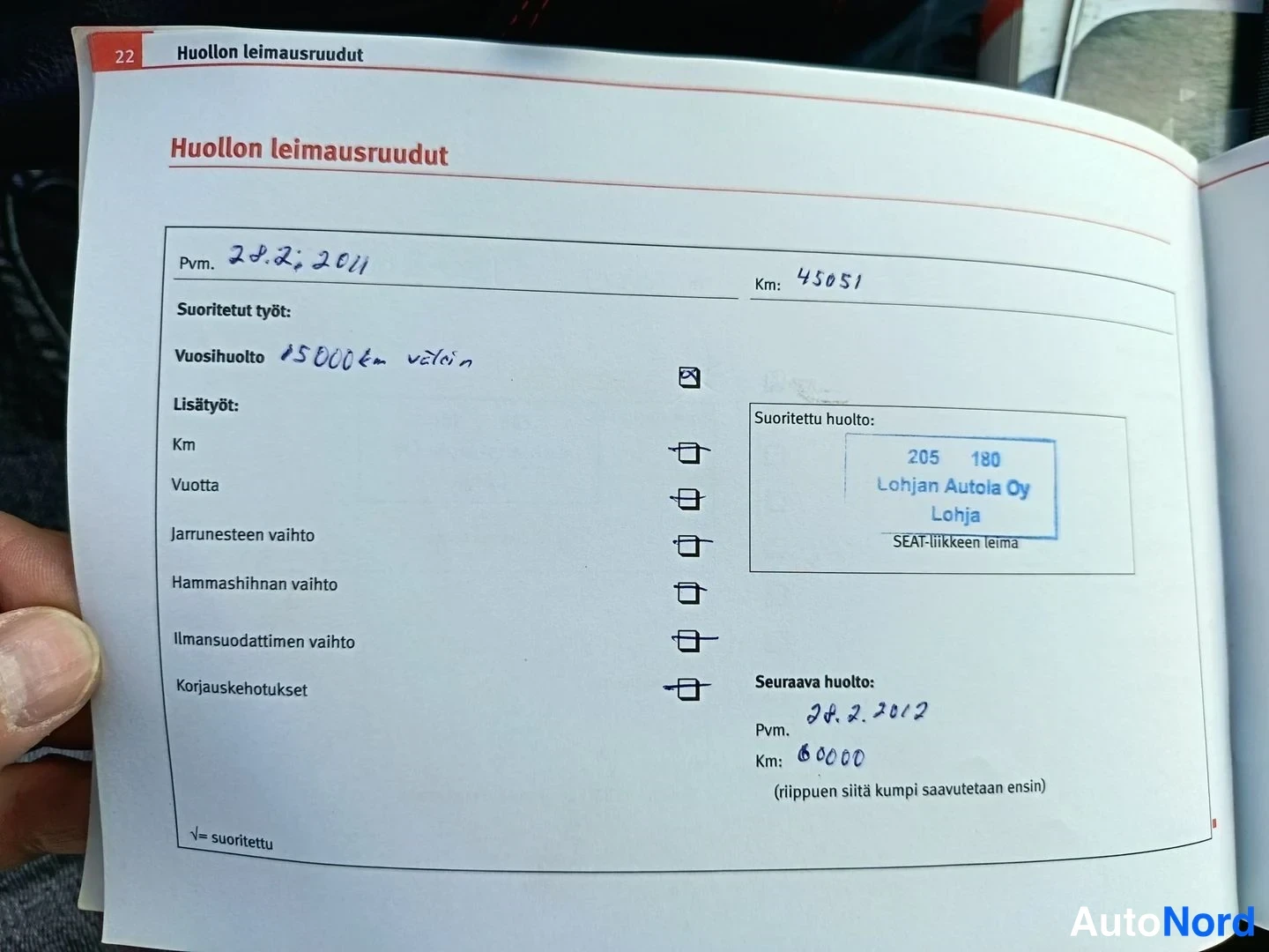 Asiakirja: Huolto-otsikko ja teksti huoltoa ja leimaa Lohjan Autola Oy, SEAT-liikkeen leima