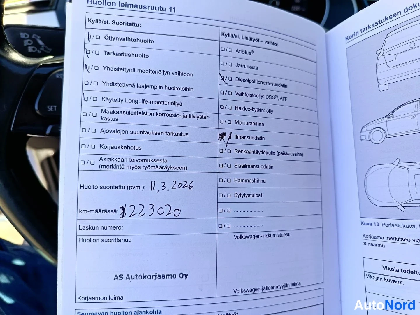 Asiakirja: Service booklet open to page titled 'Huollon leimausruutu 11'. Page contains a checklist of maintenance items and a handwritten service record showing a date of