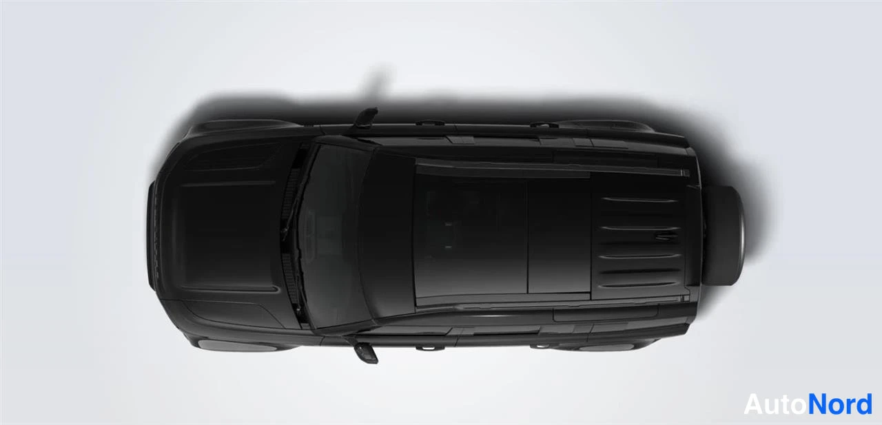 Sivulta: Land Rover Defender, musta ylhäältäpäin kuvattu yleiskuva katolle ja konepellille