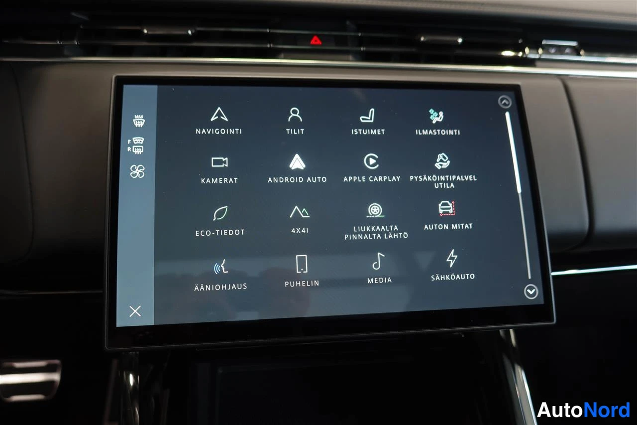 Muu: Keskinäytön valikko kuvakkeineen: navigointi, kamerat, Android Auto, Apple CarPlay, media, ääniohjaus ja sähköauto.