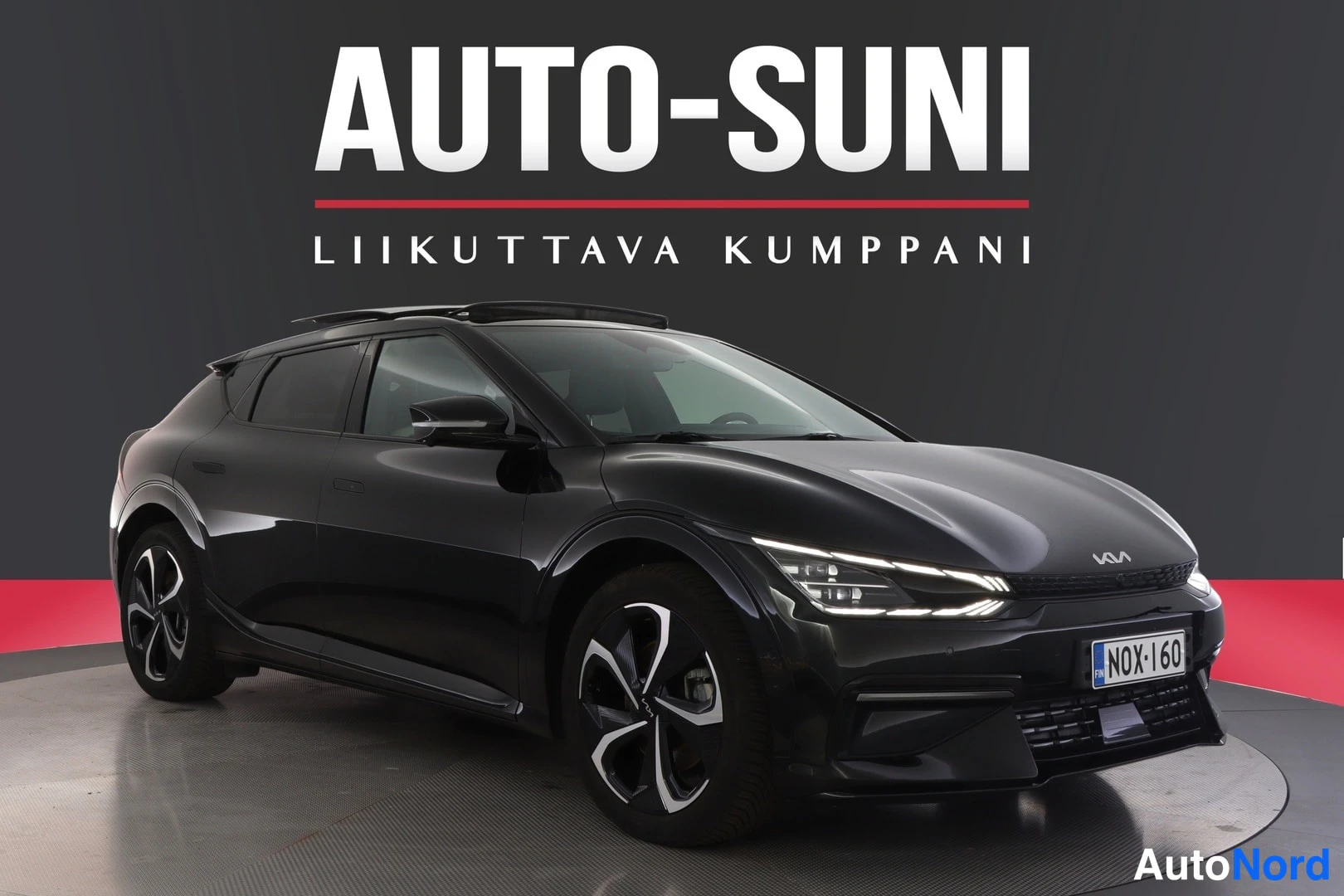 Musta Kia EV6 2023, etuviisto, keula oikealle, kuva 2
