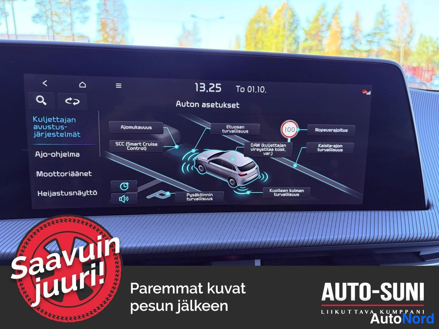 Yksityiskohta: Tallenne: auton infotainment-näyttö, jolla kuljettajan avustusjärjestelmien asetukset, kuten SCC (Smart Cruise Control) ja kaista-ajon turvallisuus.