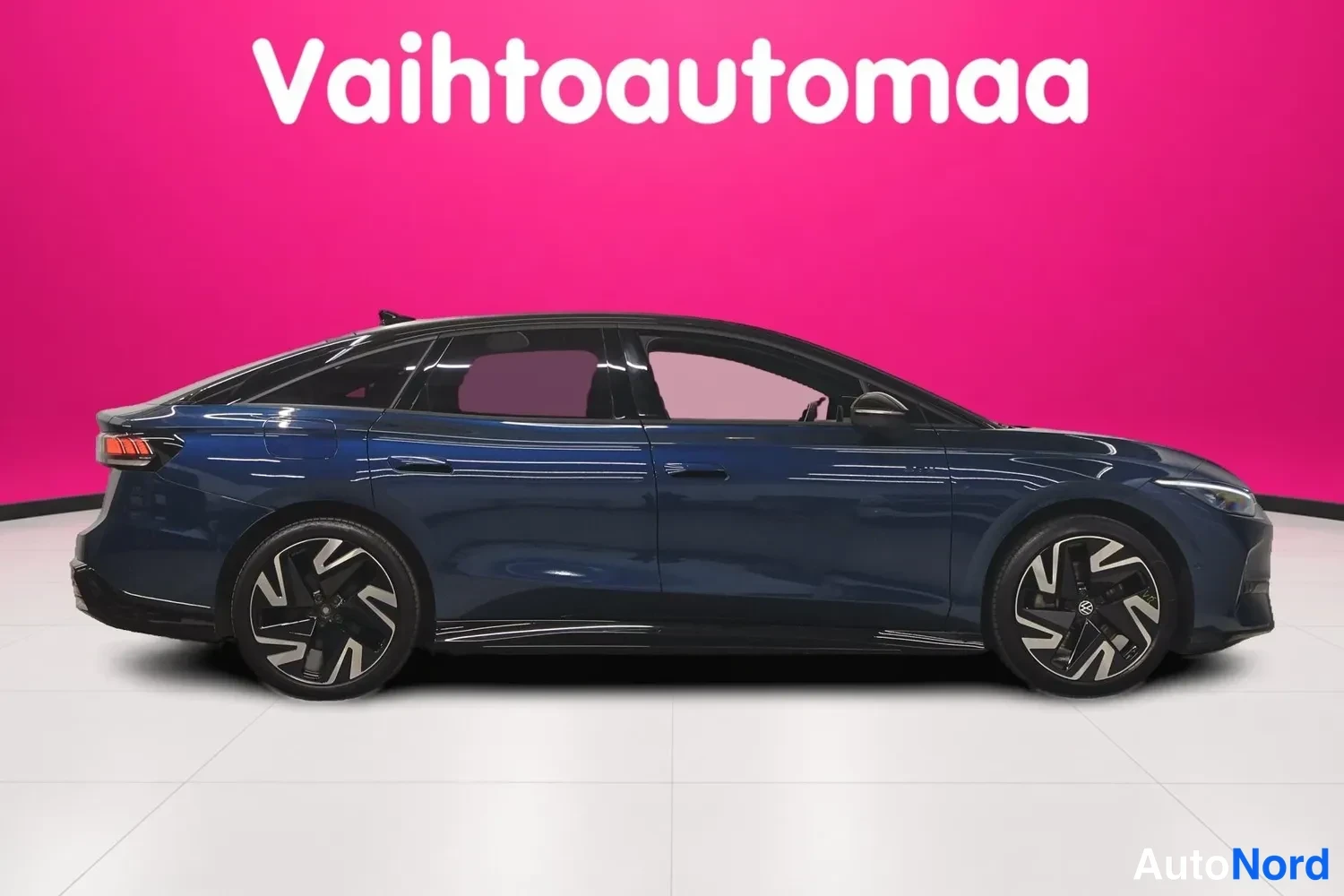 Sivulta: Tummansininen Volkswagen ID.7 GTX 4MOTION 250kW, 2026 wheel rims, image index 3