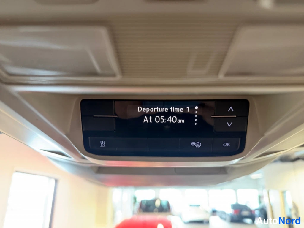 Muu: Kattokonsolin lämmitysajastin näyttää 'Departure time 1 At 05:40 am'