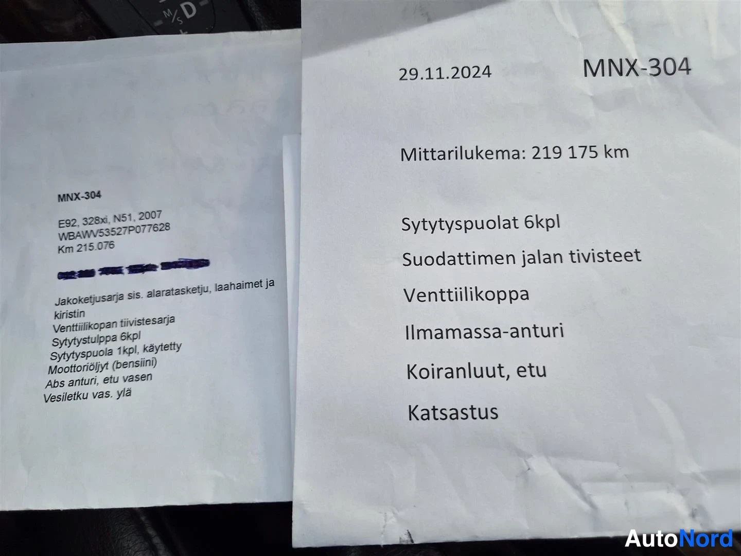 Asiakirja: Kaksi paperia: huoltoraportti rekisterillä ja lista toimenpiteistä, mm. mittarilukema 219 175 km, sytytyspuolat 6 kpl ja katsastus.