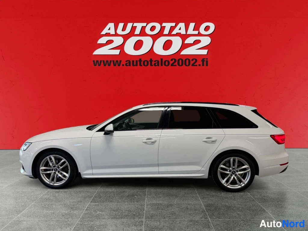 Etuviisto, nokka vasemmalle: Audi A4 Farmari; etukolmasosa vasemmalta, valkoinen