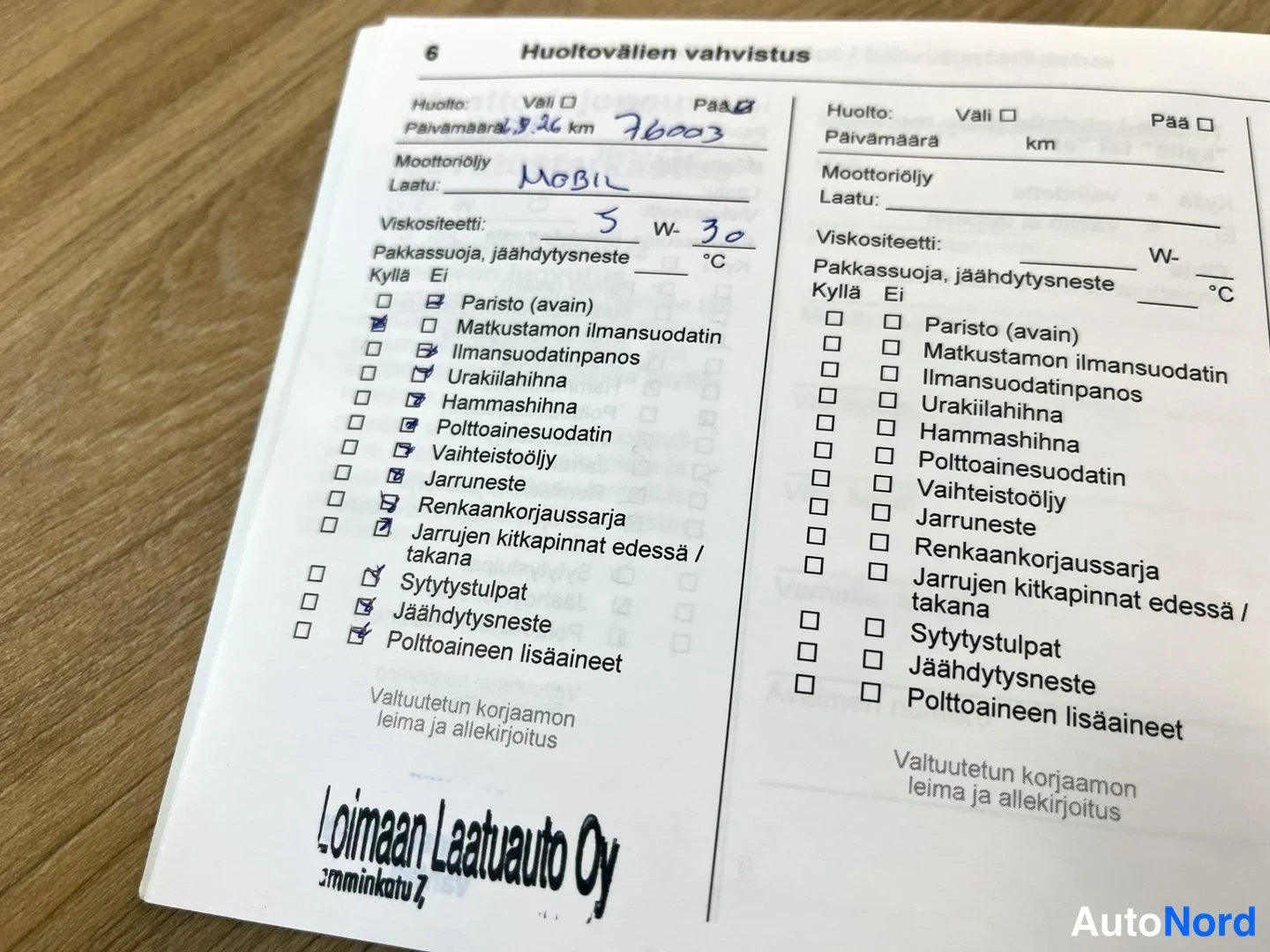 Muu: Huoltovälien vahvistus -sivu nro 6, käsinkirjoitettu päähuolto 2.9.26 (?) 76003 km, MOBIL 5W-30, huoltokohtien rastit ja Loimaan Laatuauto Oy -leima.