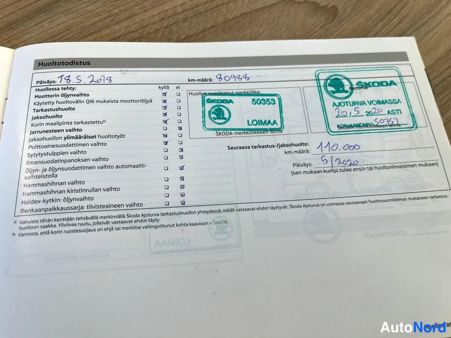 Asiakirja: Skodan huoltotodistus: huolto 18.5.2019, km-määrä 80 986, leimalla Skoda Loimaa 50353.