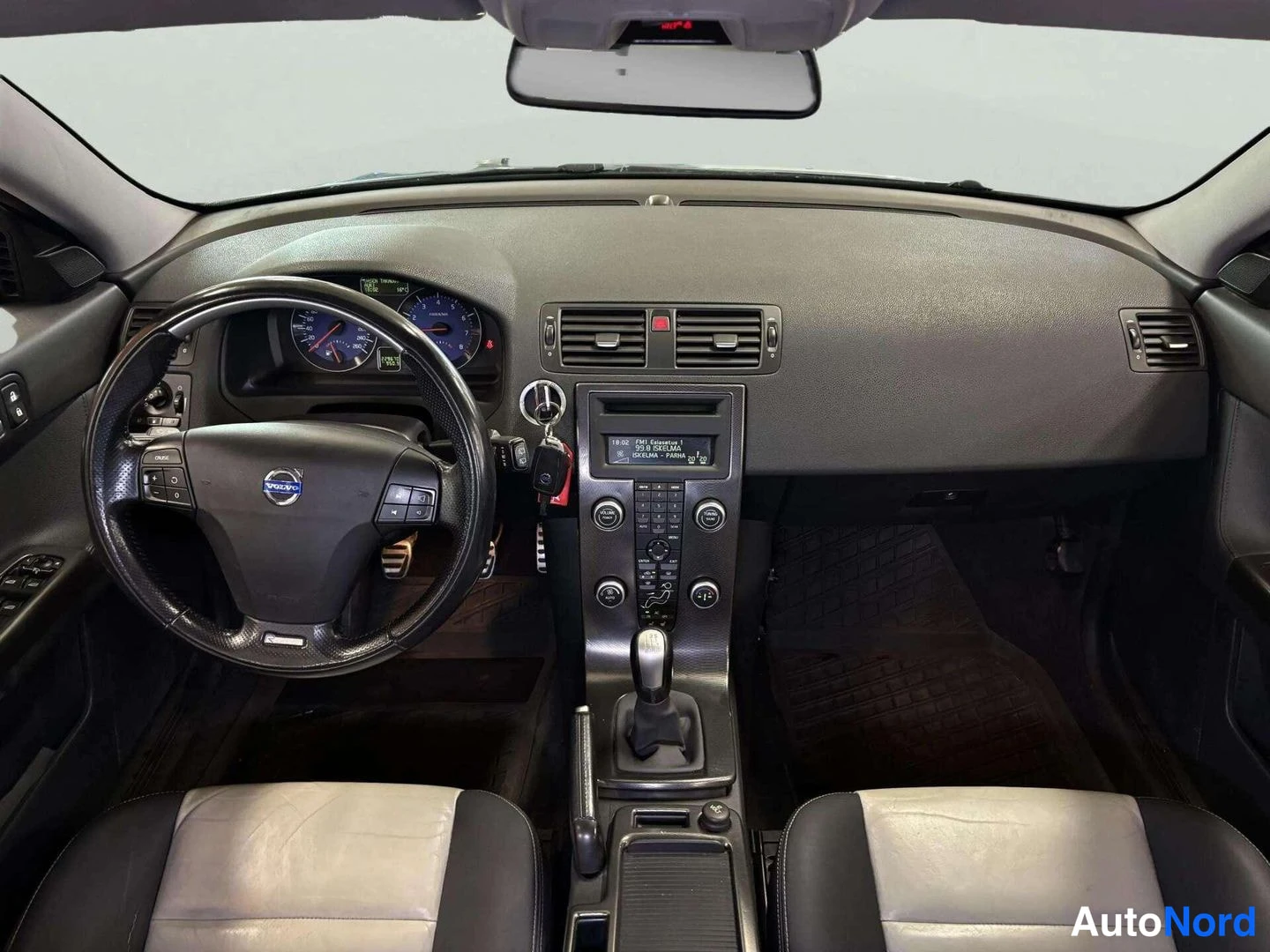 Turkoosi Volvo V50 2008, etuviisto, keula vasemmalle, kuva 6