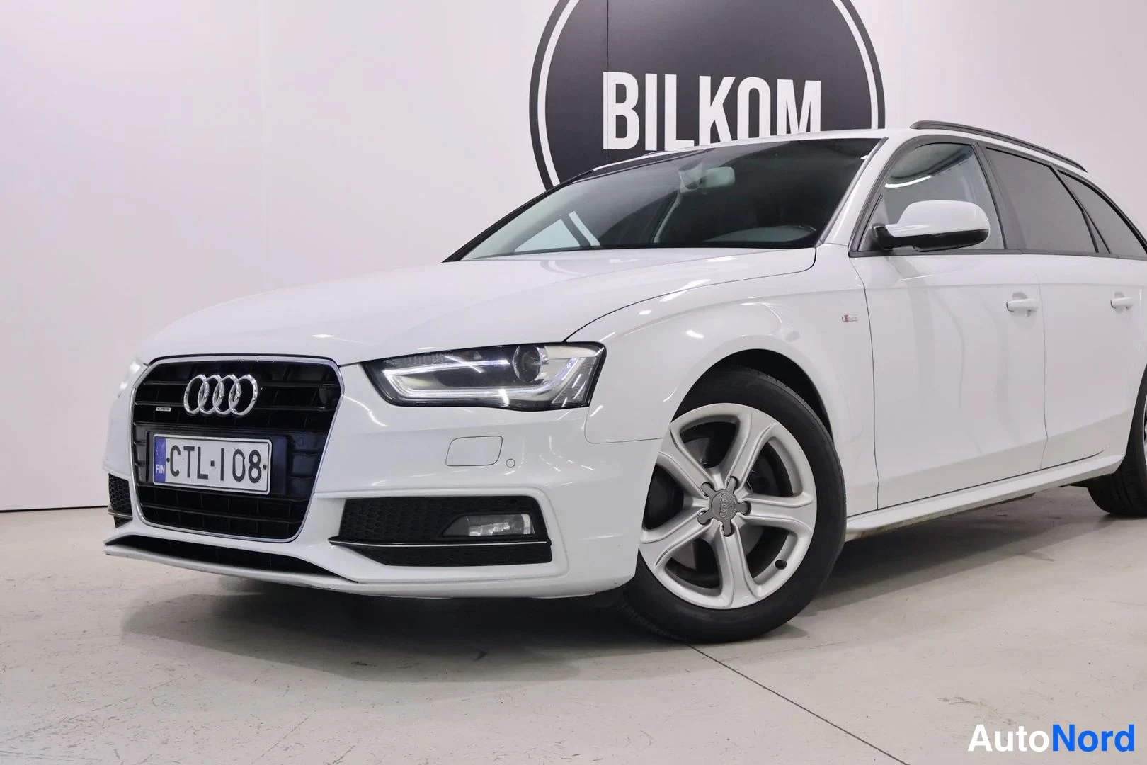 Valkoinen Audi A4 Avant 2015, etuviisto, keula vasemmalle, kuva 4
