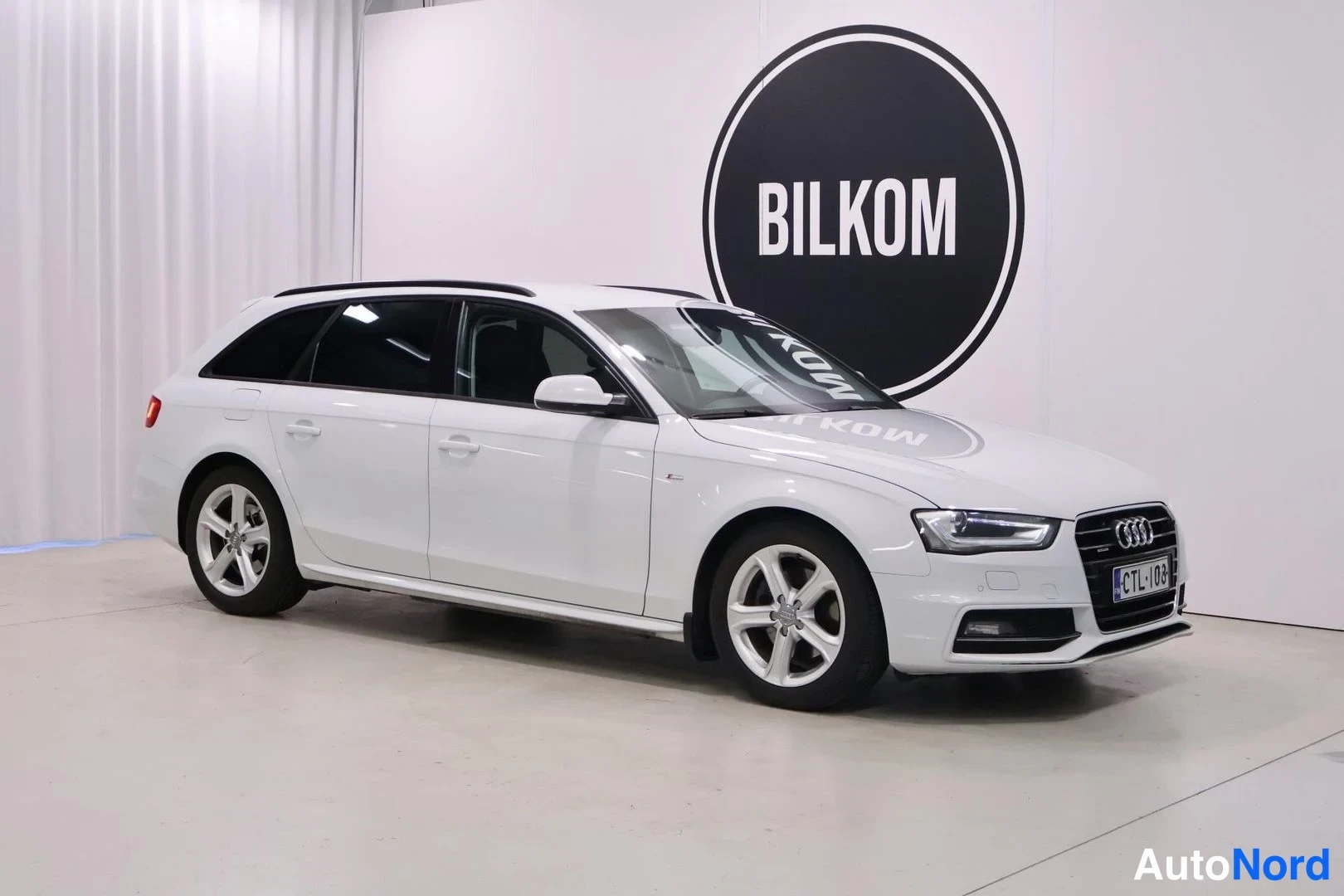 Valkoinen Audi A4 Avant 2015, etuviisto, keula oikealle, kuva 5