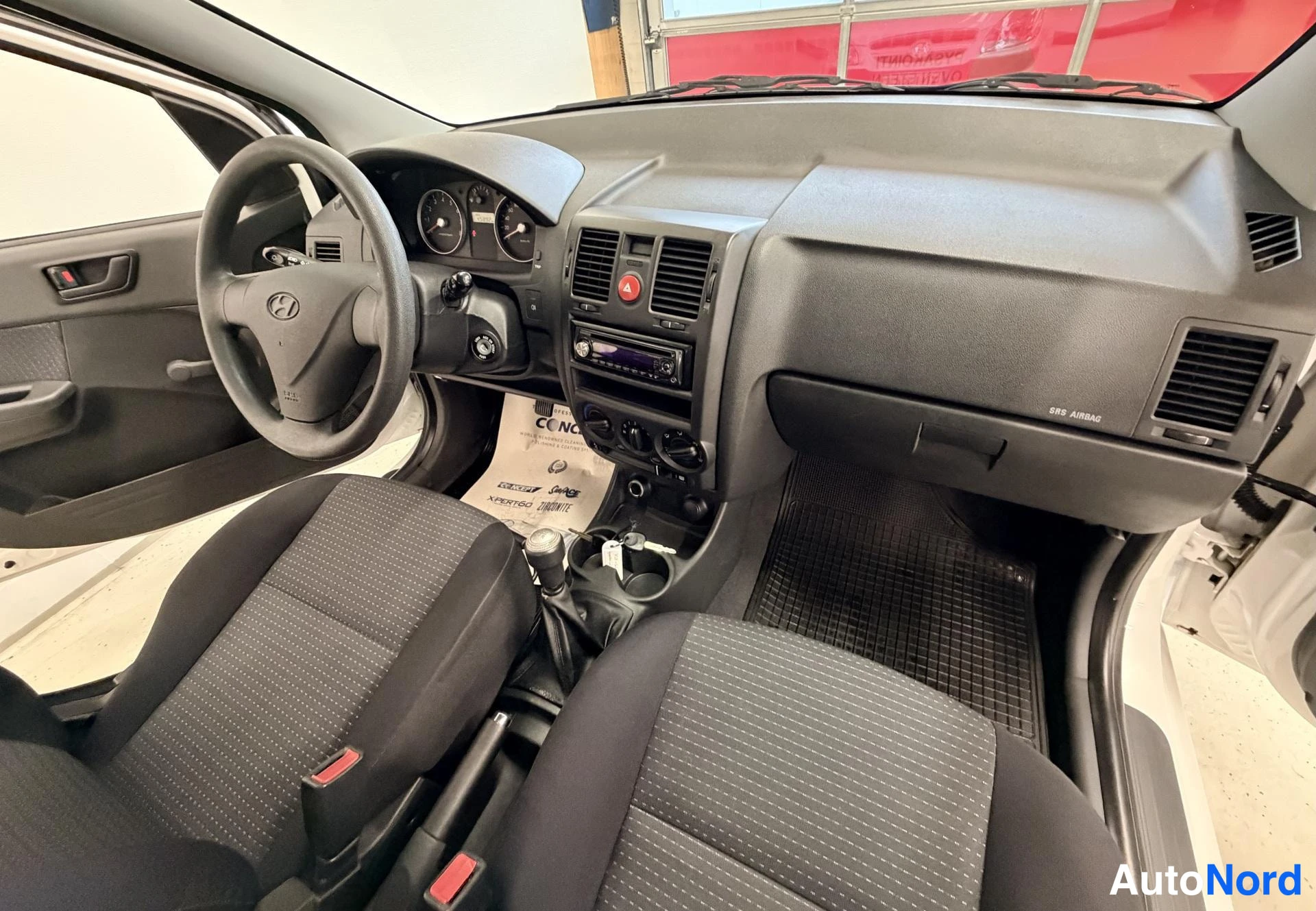 Valkoinen Hyundai Getz 2008, sivulta, kuva 8