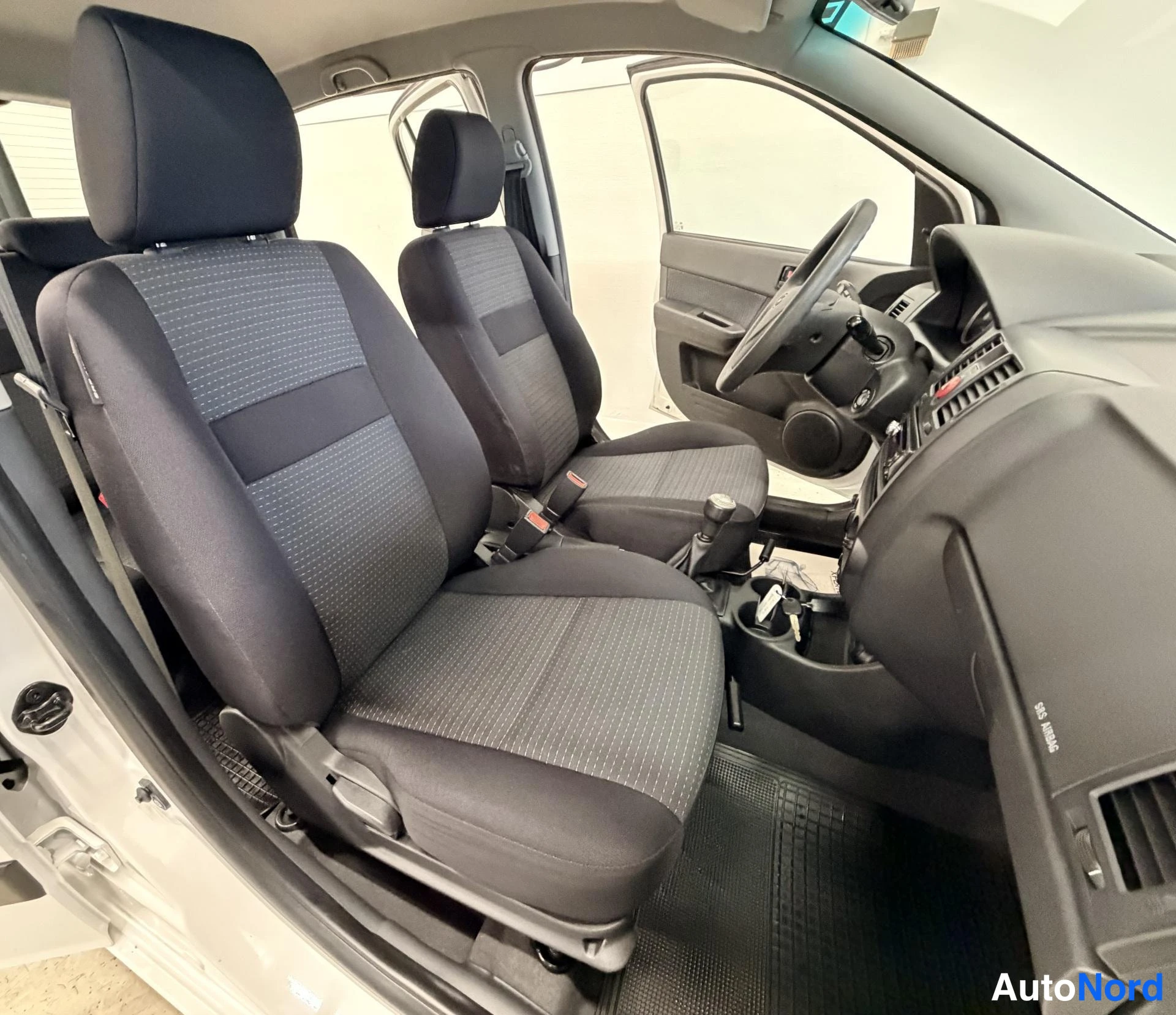 Valkoinen Hyundai Getz 2008, sivulta, kuva 7