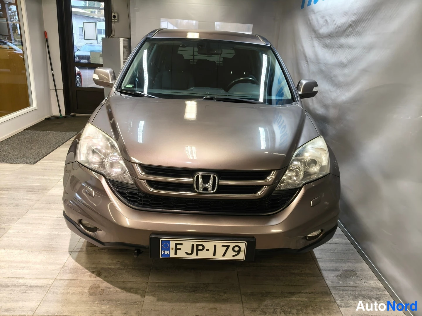 Ruskea Honda CR-V 2010, edestä, kuva 3