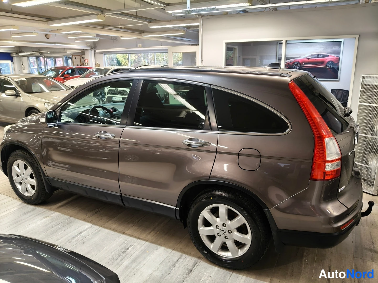 Ruskea Honda CR-V 2010, takaviisto, kuva 6