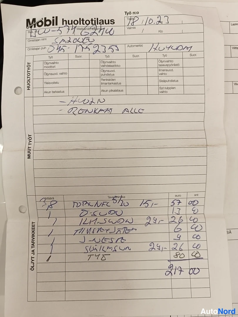 Sivulta: Handwritten service order form (Möbil huoltotilaus) from work number 2.10.23: on the left the vehicle registration plate, on the right 'AMUMD'; below handwritte